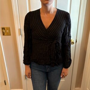 Chic Black Blouse with Gold Accents